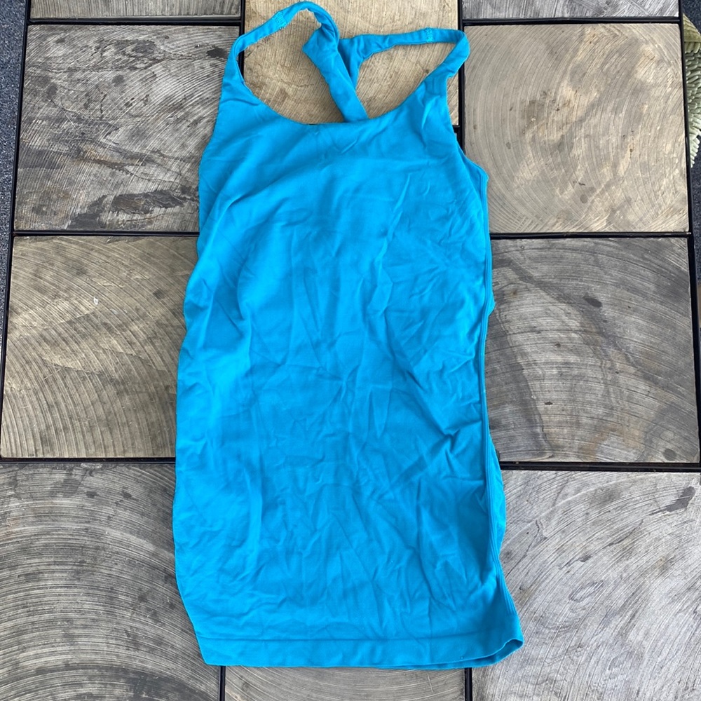 BEBE turquoise twisted back tank top with built in bra
